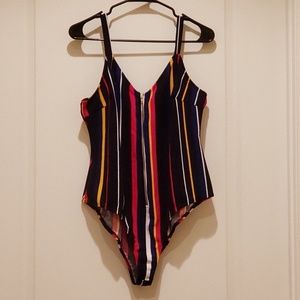 Strappy striped bodysuit with zipper down front